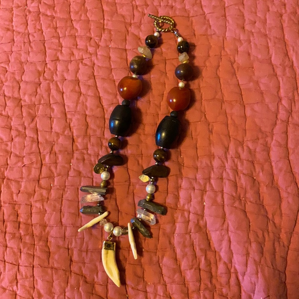 One of a kind designed neckart with wolves teeth
